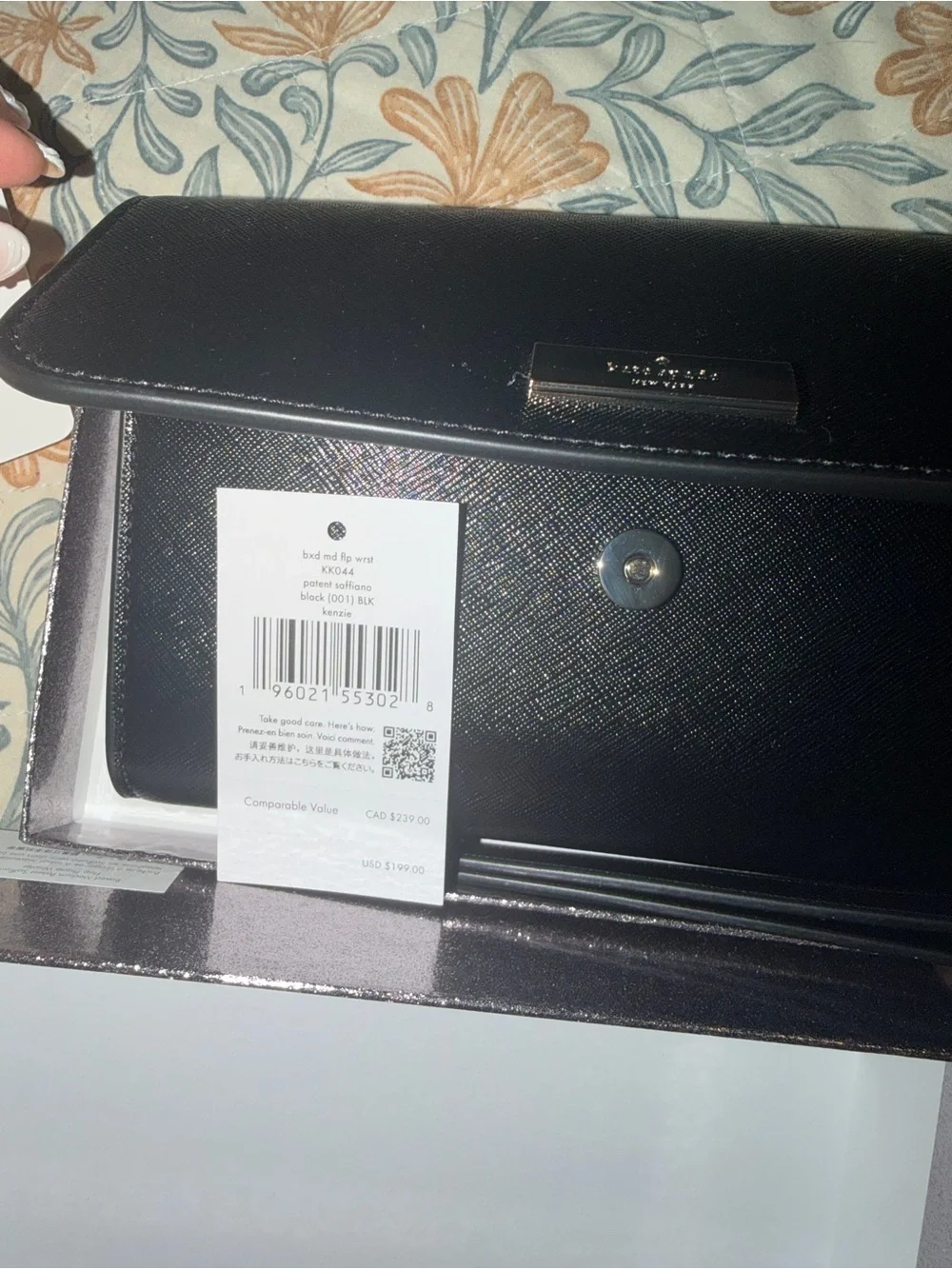 kate spade black saffiano leather flap wallet with gold plaque